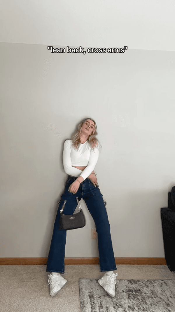 "lean back, cross arms"